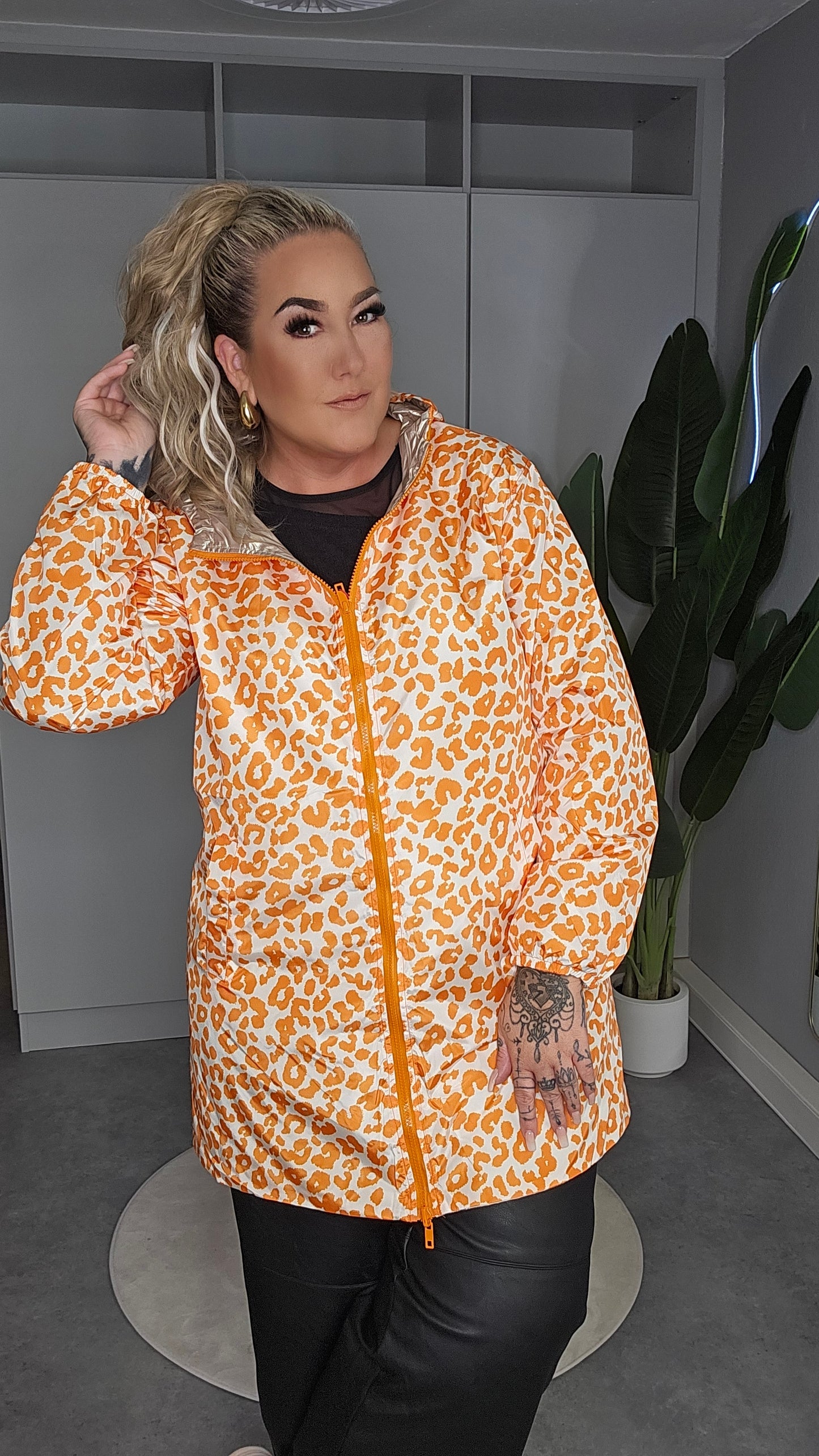 Leoparden Regenparker