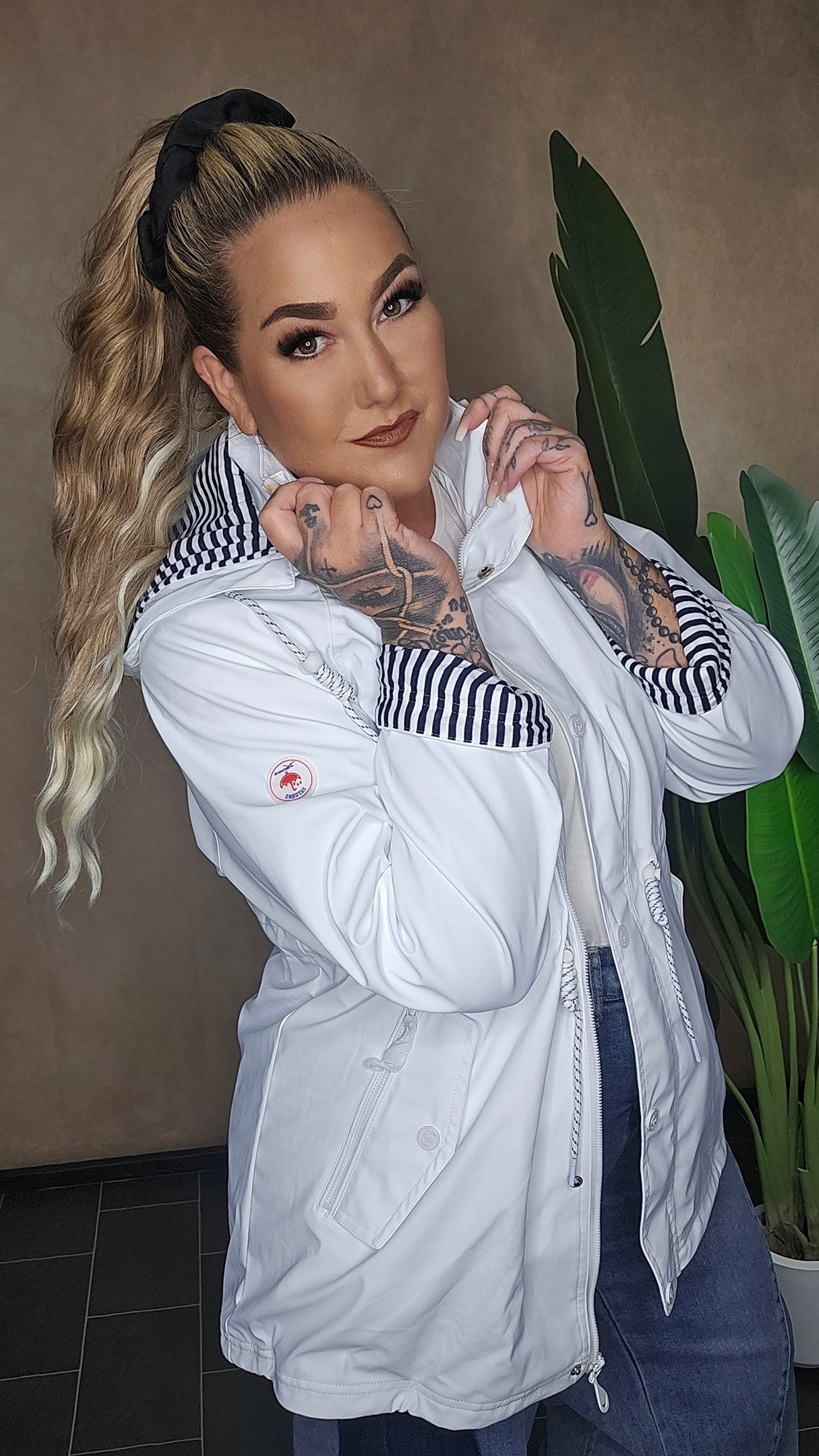 Elegante Weiße Regenjacke – Stylisch und 100% Wetterfest