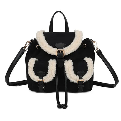 Teddy Rucksack Schwarz mit cremefarbenem Fell-Besatz und goldenen Schnallen – Frontansicht
